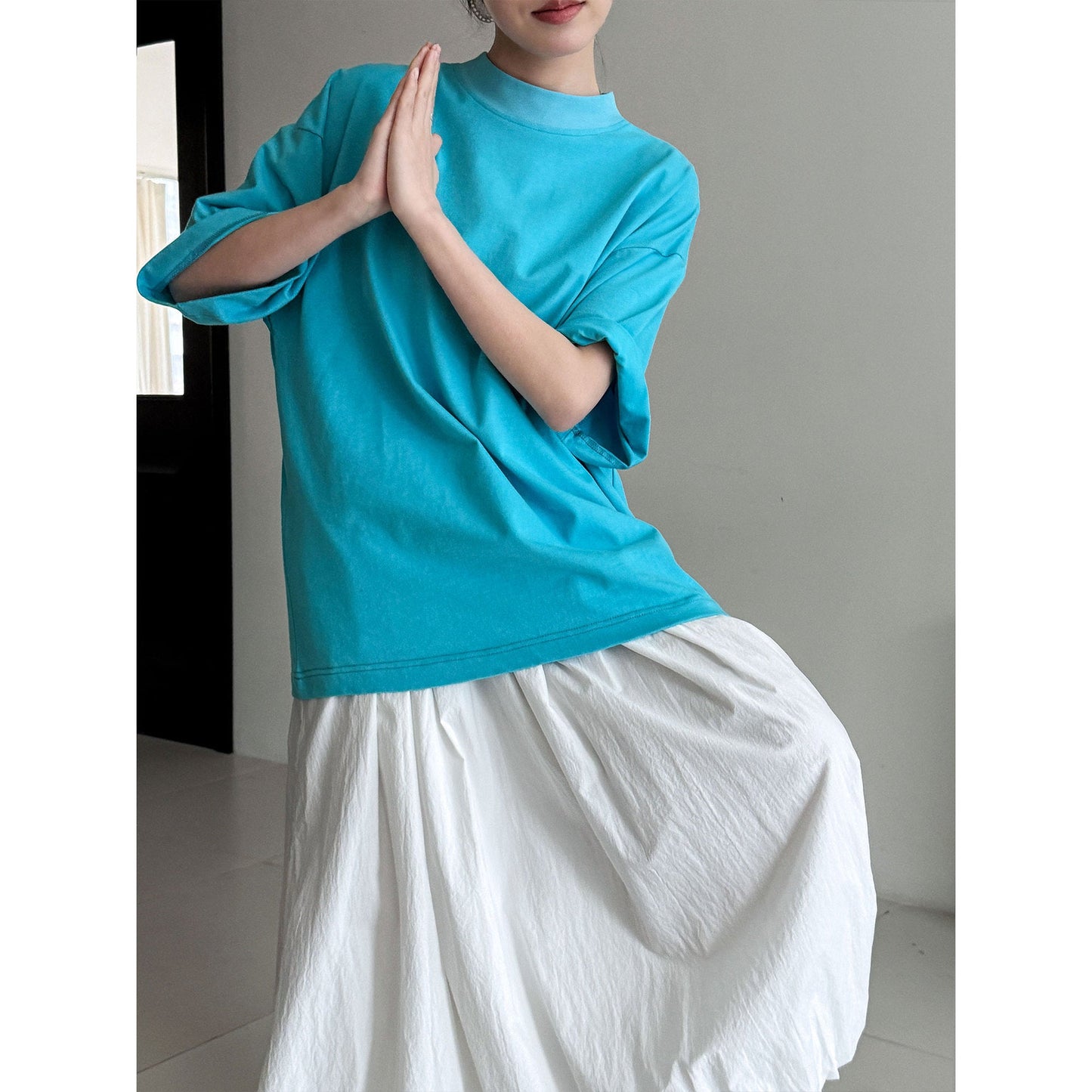 Casual solid color polished loose shoulder short sleeve women's early spring new silhouette simple round neck T-shirt