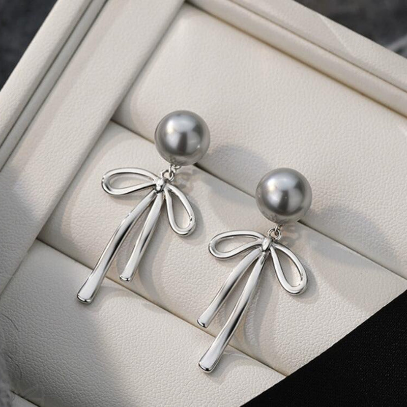 Cold sense pearl bow stud earrings niche light luxury high sense earrings cold wind temperament versatile commuter earrings