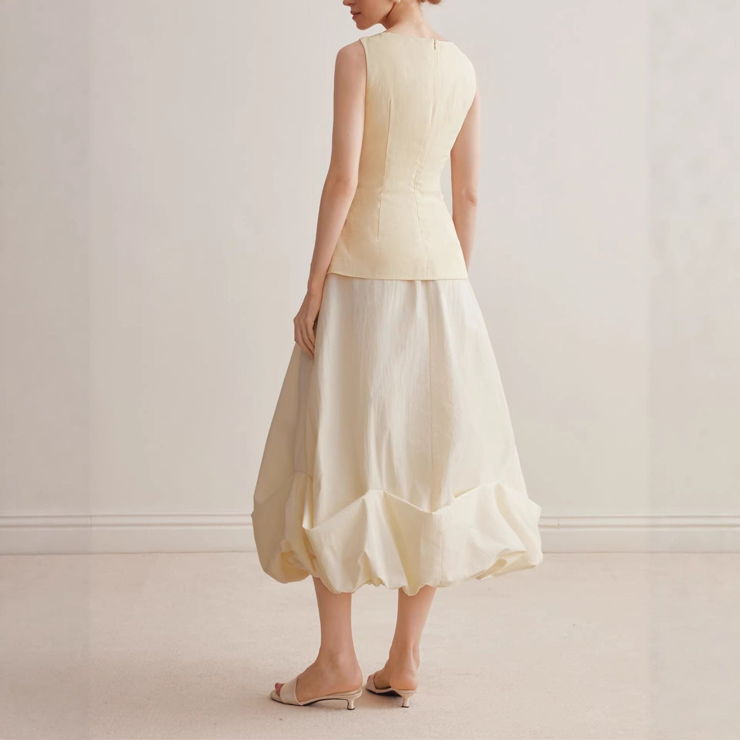 Temperament bud skirt 2026 spring and summer design sense pinch pleated hem small a-shaped skirt