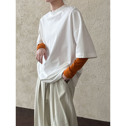 Casual solid color polished loose shoulder short sleeve women's early spring new silhouette simple round neck T-shirt