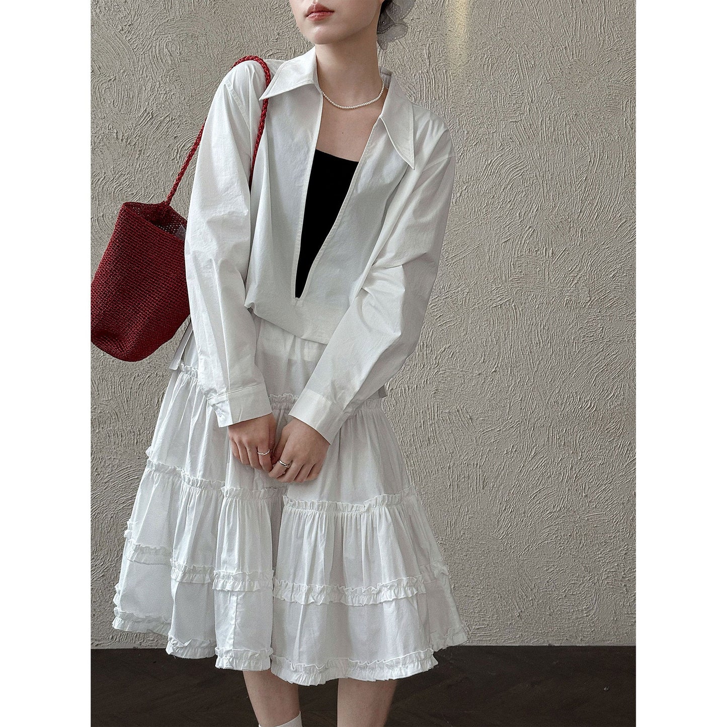 Design sense large v-neck loose casual long-sleeved shirt women's early spring new stacked French top