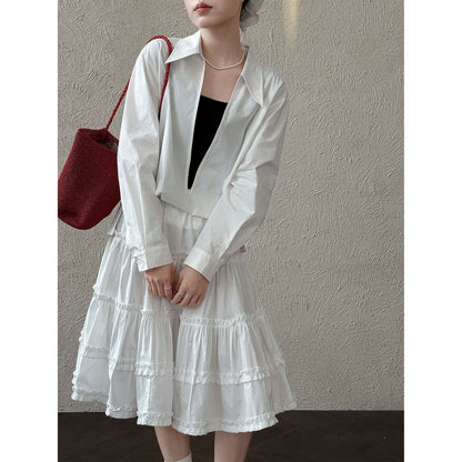 Design sense large v-neck loose casual long-sleeved shirt women's early spring new stacked French top