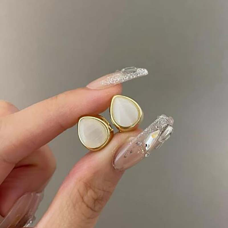Authentic niche design feeling ice transparent opal double-sided water drop ear buckle exquisite versatile earrings temperament light luxury earrings