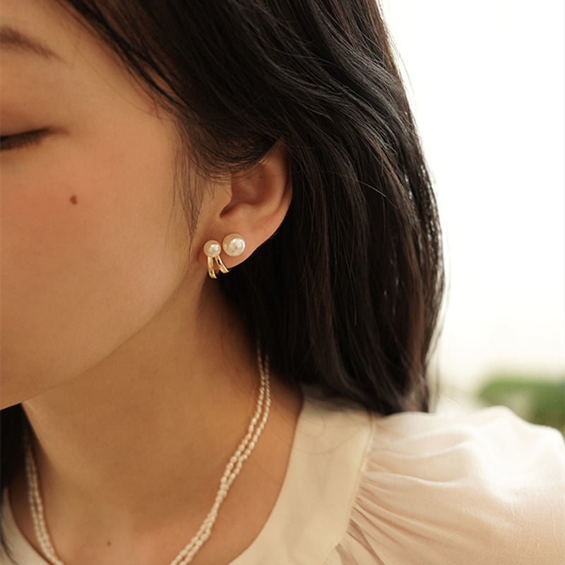 Curved hook pearl earrings New trendy niche design stud earrings Women's sterling silver light luxury high-end versatile earrings