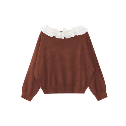 A beautiful lace slanted shoulder open-back knit sweater
