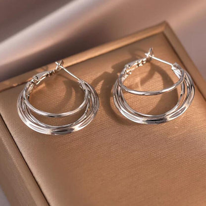 Gold circle earrings, new three-line high-end, unique earrings, fashionable and personalized ins stud earrings, women's earrings.