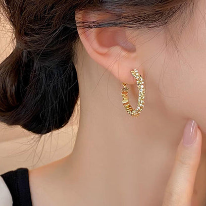 Broken silver unique circle earrings women's niche light luxury design ear buckle 2024 new popular high-end earrings