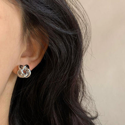 Winding twist Japanese and Korean simple design stud earrings niche versatile hollow earrings metal kink cold wind women's earrings
