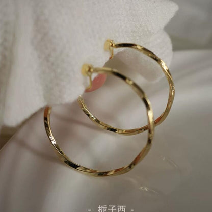 Premium sense metal mosquito coil disc loop earrings French ear clips can be worn without ear piercings, earrings are simple, fashionable and versatile