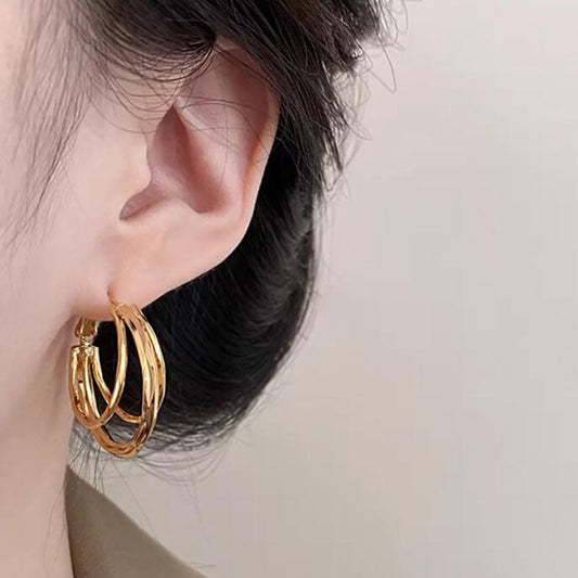Gold circle earrings, new three-line high-end, unique earrings, fashionable and personalized ins stud earrings, women's earrings.