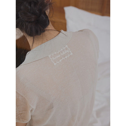 Delicate embroidered lapel single-breasted knitted sweater on the back