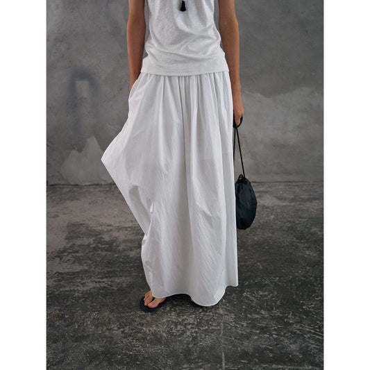 The cotton feels irregular, elastic and thin, lazy, loose pendulum medium and long skirt.