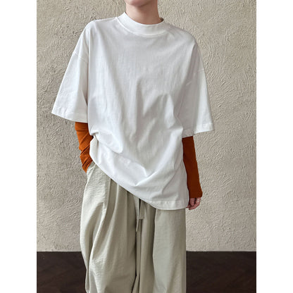 Casual solid color polished loose shoulder short sleeve women's early spring new silhouette simple round neck T-shirt