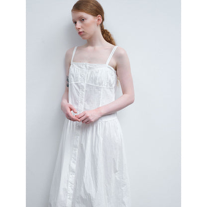 Summer new casual one-word collar pleated design sense solid color lace-up long suspender skirt