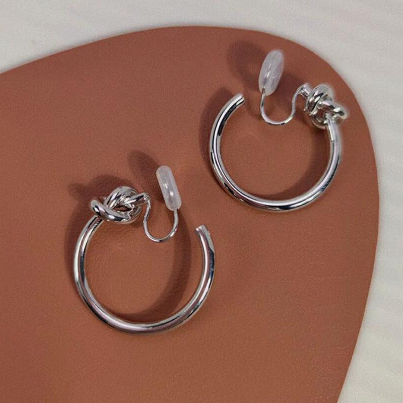 Cold wind knotted large circle without ear holes, mosquito coil disc, ear clips, silver needle, round earrings, Hong Kong style femininity niche earrings