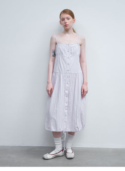 Summer new casual one-word collar pleated design sense solid color lace-up long suspender skirt