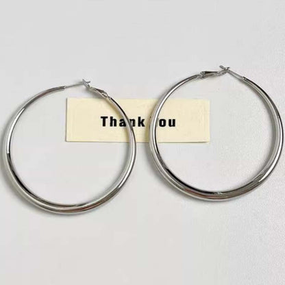 Light luxury niche design high-end earrings, circle earrings.