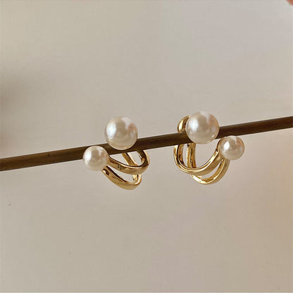 Curved hook pearl earrings New trendy niche design stud earrings Women's sterling silver light luxury high-end versatile earrings