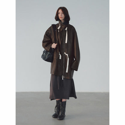 Stand-up collar streamer waist PU leather jacket, early spring new loose long commuter textured jacket