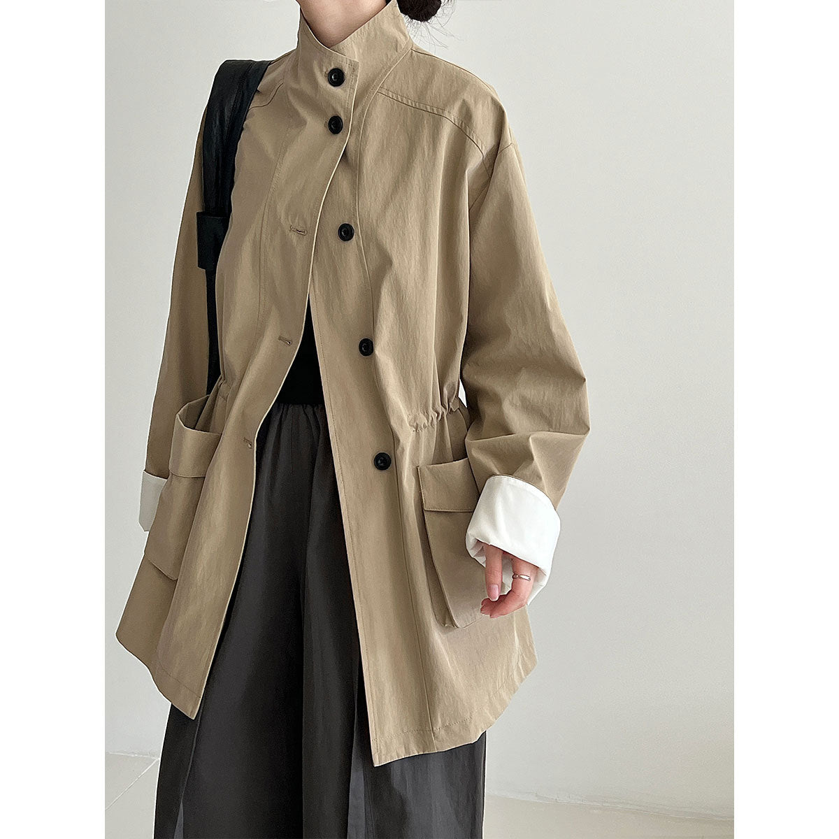 Korean medium and long stand-up collar loose drawstring trench coat women's autumn new big pocket design coat