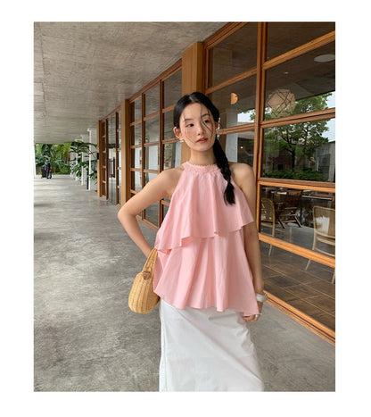 A beautiful halterneck shirt with ruffled edges and sleeveless tops