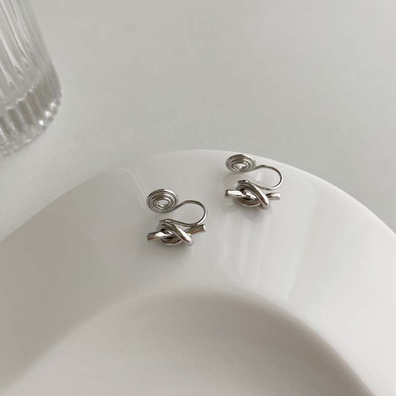 Retro simple cold wind earrings knotted mosquito coil disc earclips versatile temperament geometric irregular earrings