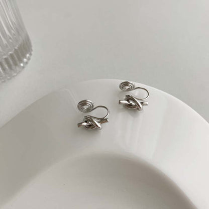 Retro simple cold wind earrings knotted mosquito coil disc earclips versatile temperament geometric irregular earrings