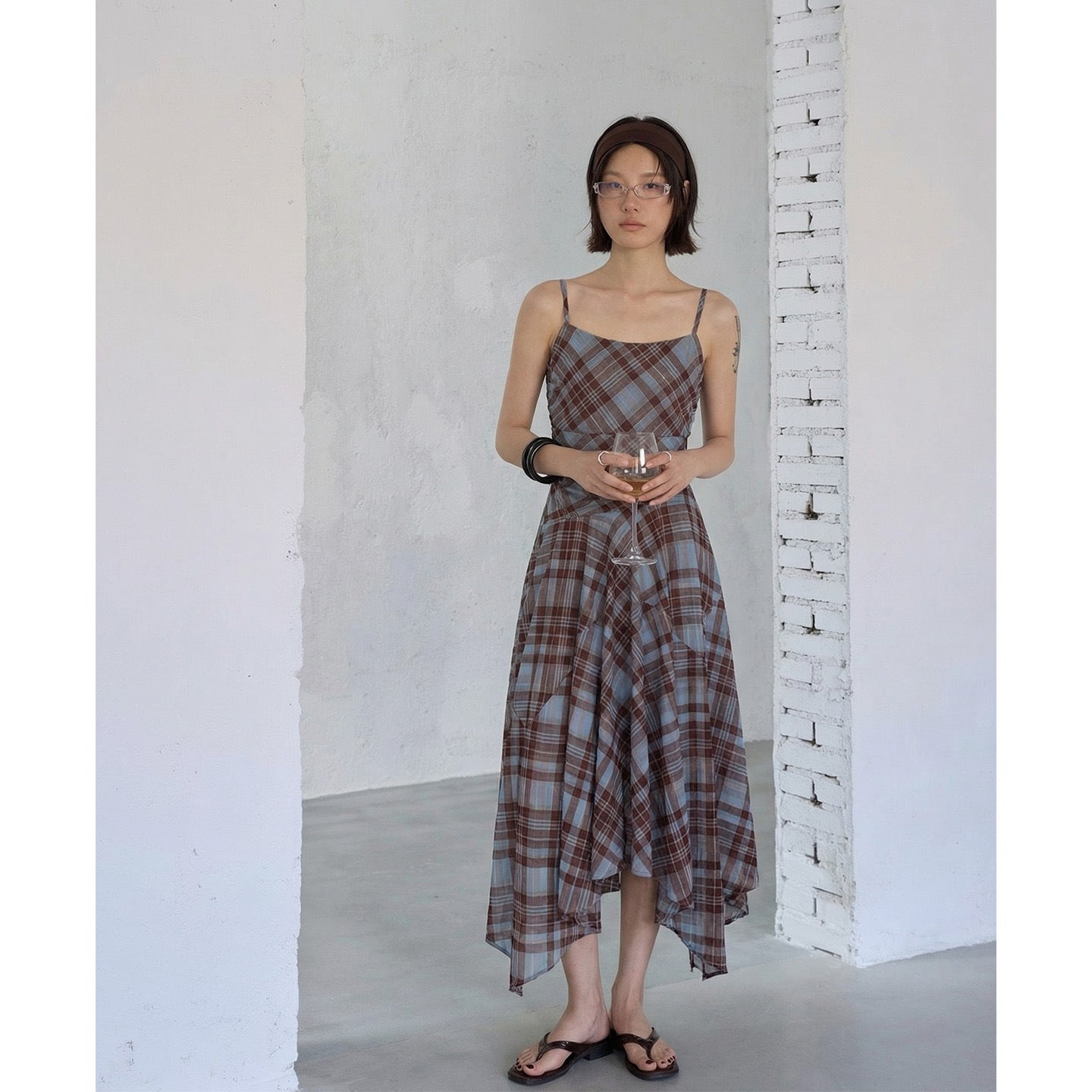 Irregularly deconstructed plaid suspender dress
