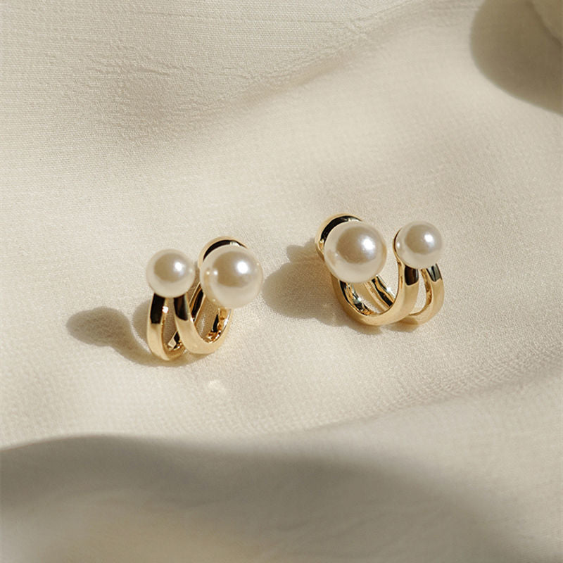 Curved hook pearl earrings New trendy niche design stud earrings Women's sterling silver light luxury high-end versatile earrings
