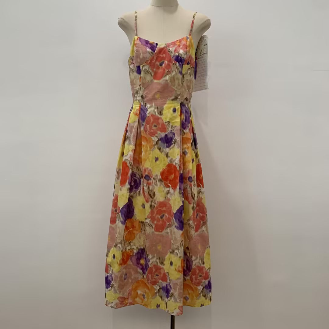 Romantic vacation style age-reducing floral suspender dress