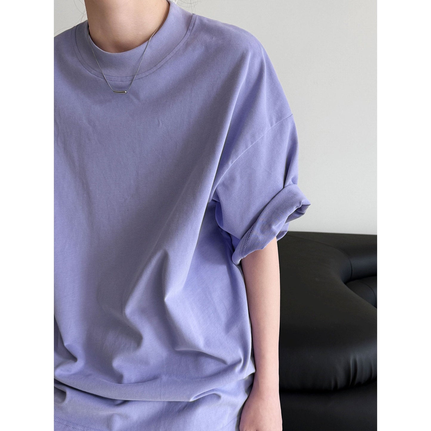 Casual solid color polished loose shoulder short sleeve women's early spring new silhouette simple round neck T-shirt