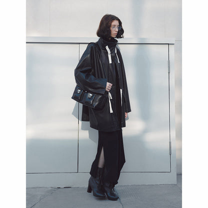 Stand-up collar streamer waist PU leather jacket, early spring new loose long commuter textured jacket