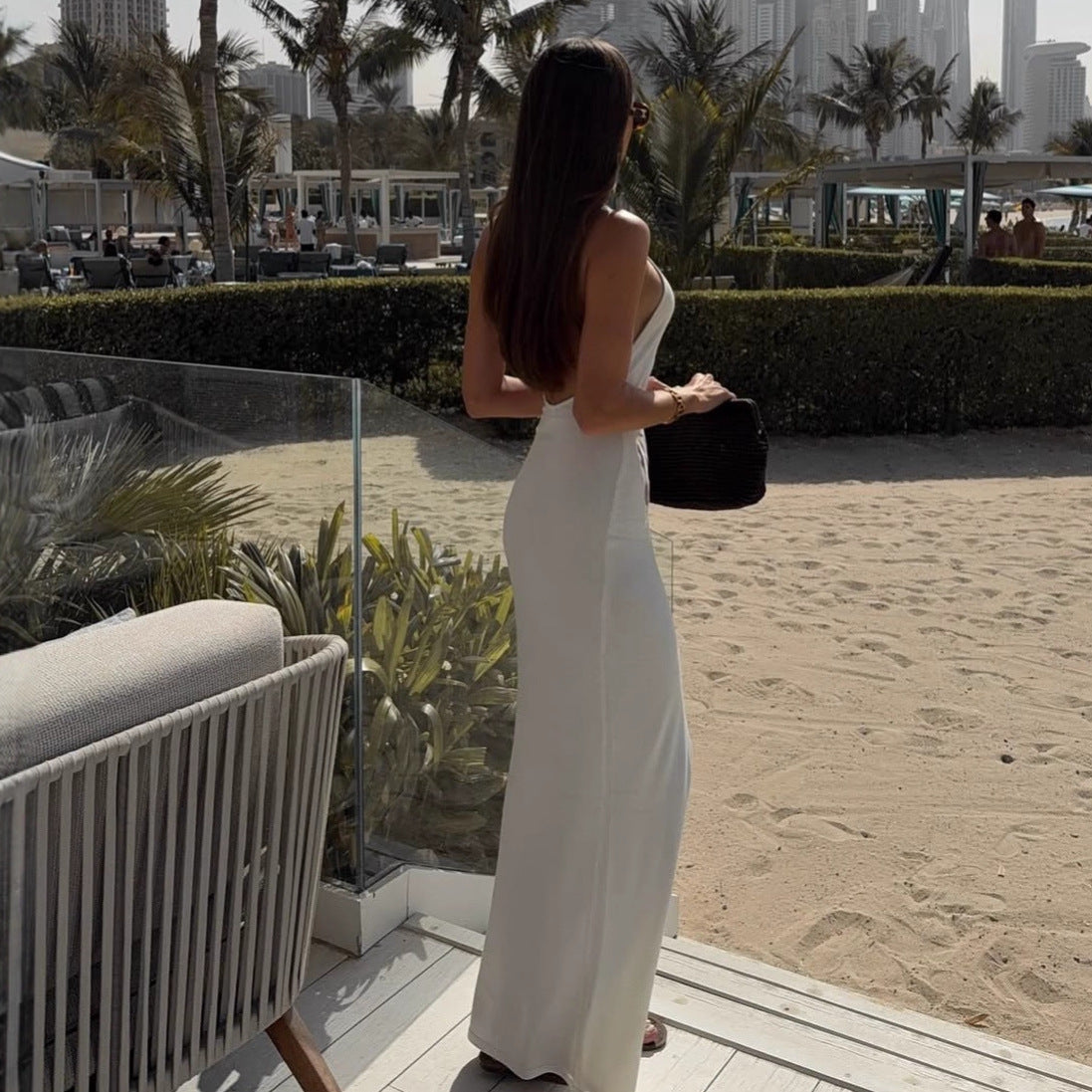 Sexy slim-fit hollowed-out neck-hanging knitted hip-wrapped skirt backless vacation dress