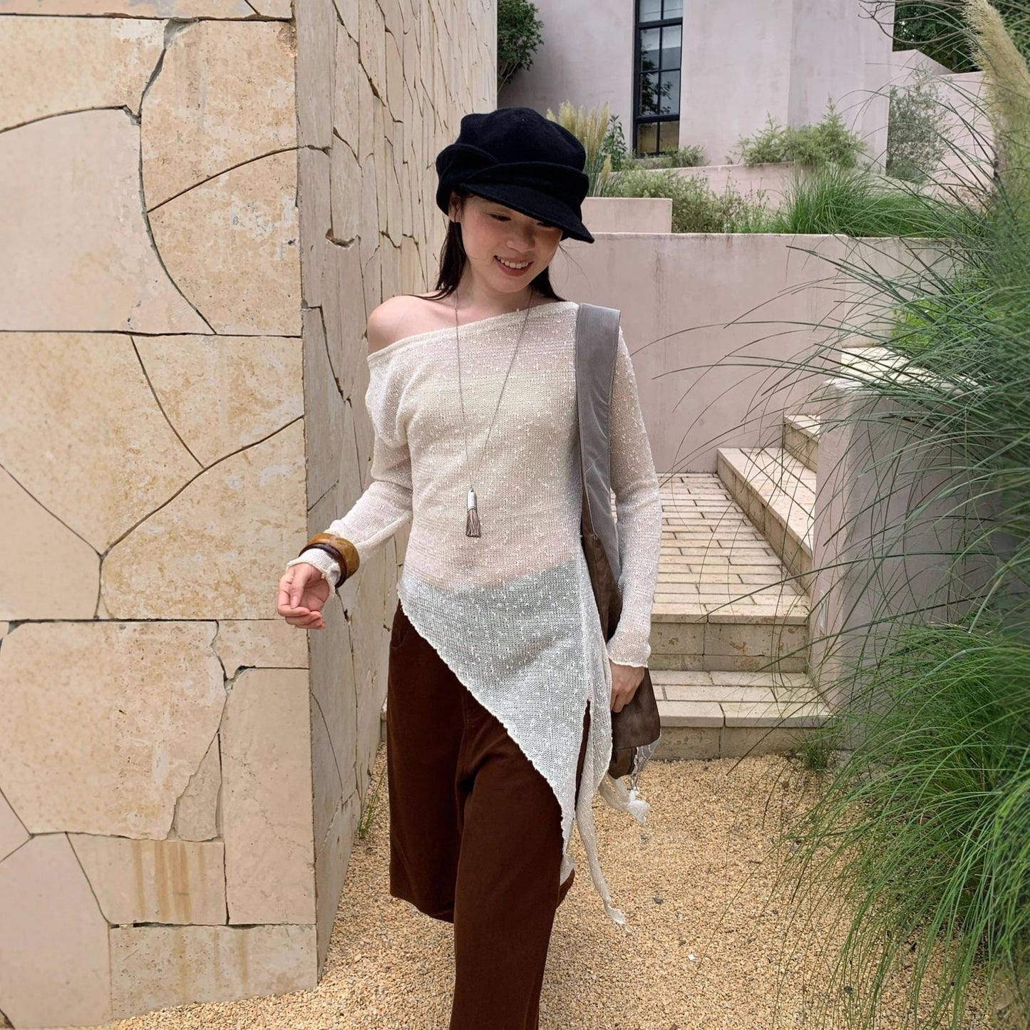 Autumn French pure desire wind hollowed-out slanted shoulder long-sleeved asymmetrical knitted sweater