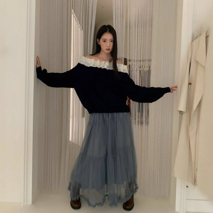 A beautiful lace slanted shoulder open-back knit sweater