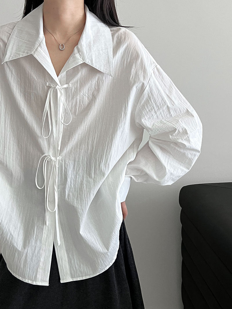 Korean small fresh temperament design sense lace-up shirt women's early autumn new niche loose top
