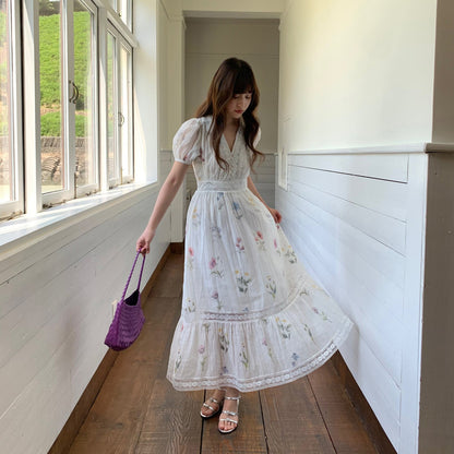 Gentle high-waisted V-neck floral cotton and linen puff sleeve dress