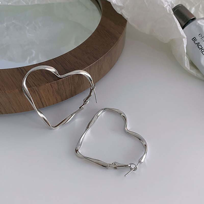 Korean silver love earrings earrings 925 silver needle light luxury high-end niche design earrings factory direct sales