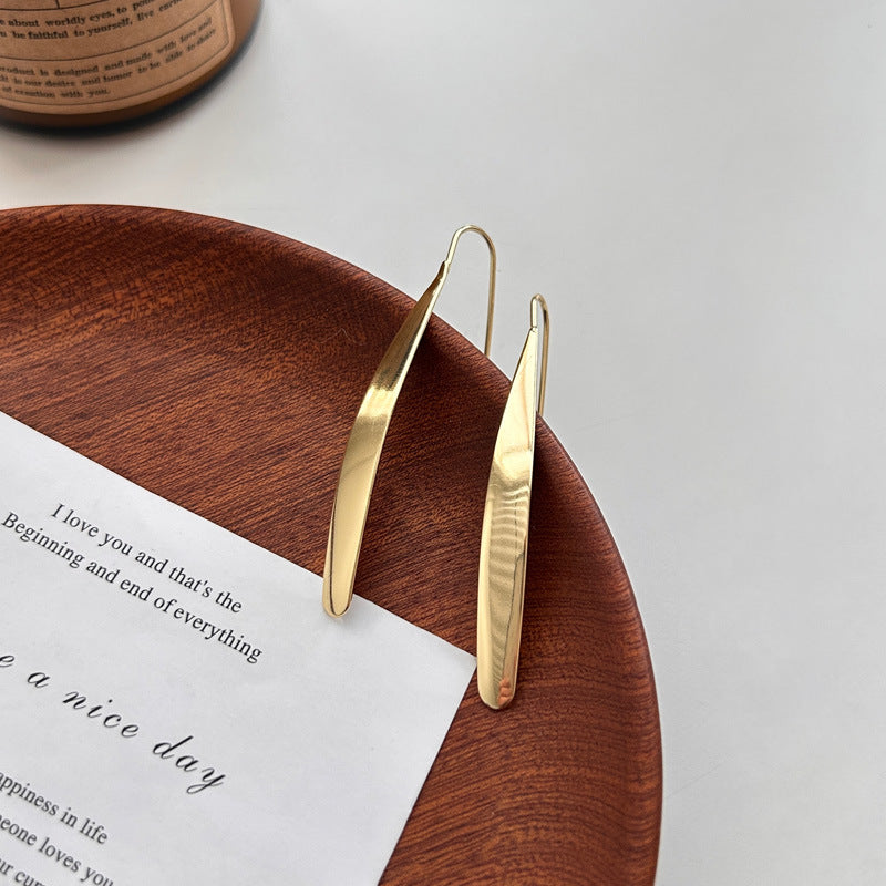 New Korean version glossy long stud earrings long temperament women's simple versatile ear hanging earrings