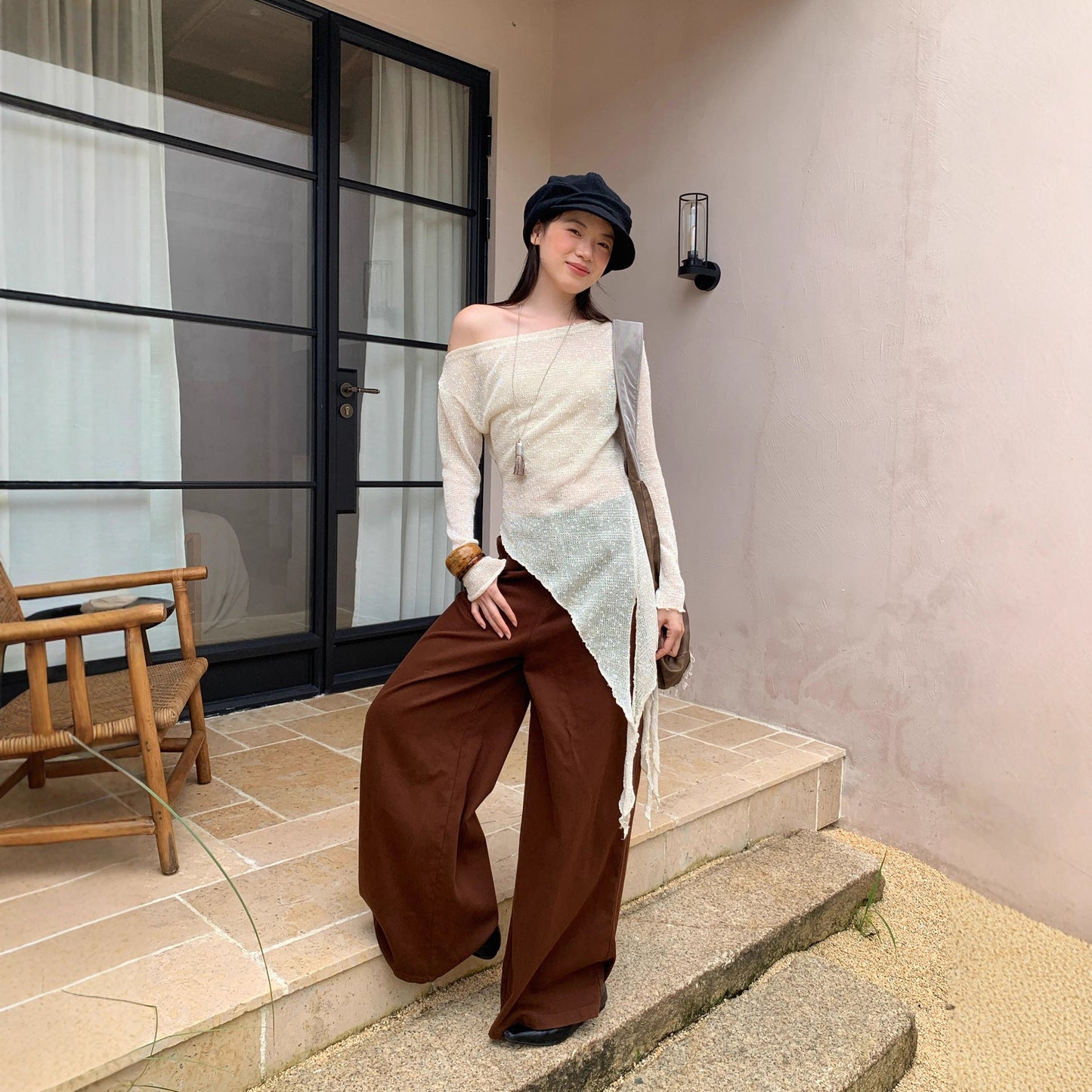 Autumn French pure desire wind hollowed-out slanted shoulder long-sleeved asymmetrical knitted sweater