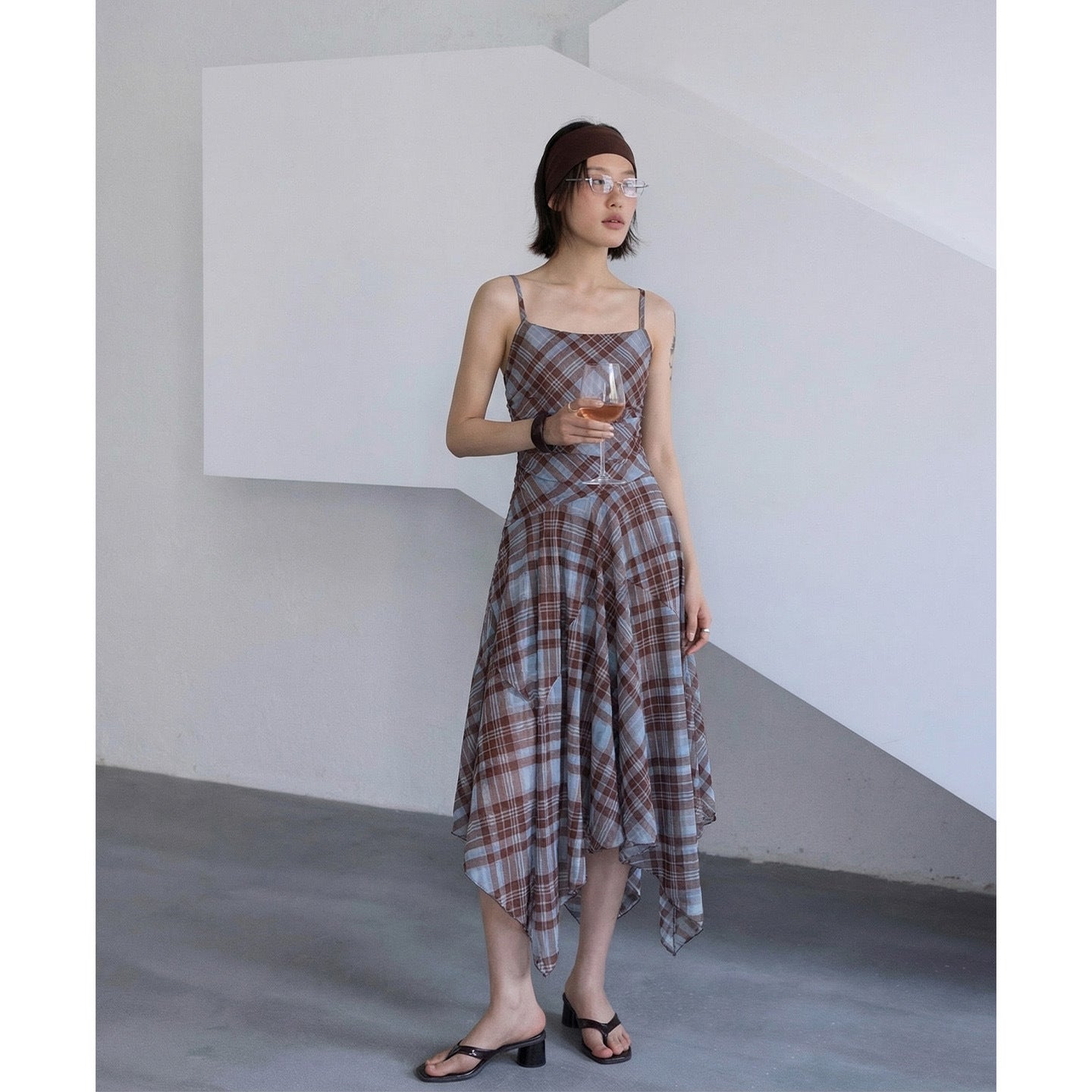 Irregularly deconstructed plaid suspender dress