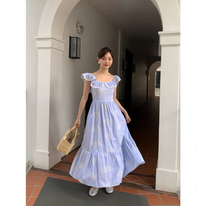 Beautiful embroidered high-waisted swinging ruffle-edged sleeveless dress