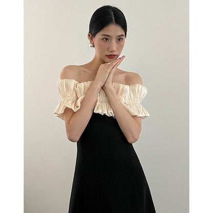 One-word shoulder dress for two women wearing a dress dress
