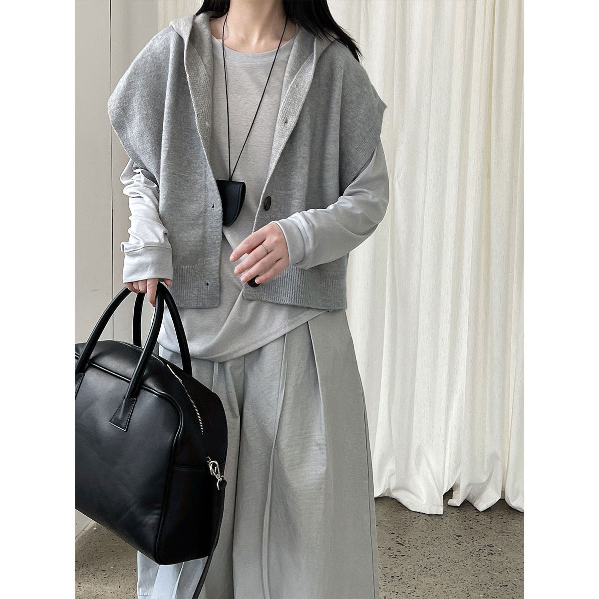 Korean loose large version hooded sleeveless knitted cardigan women's autumn new stacked short vest ss845