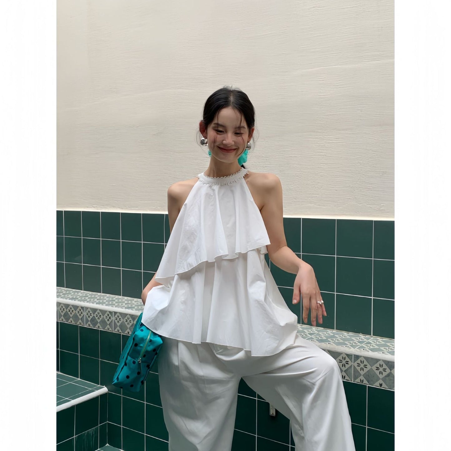 A beautiful halterneck shirt with ruffled edges and sleeveless tops