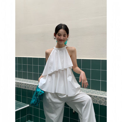 A beautiful halterneck shirt with ruffled edges and sleeveless tops