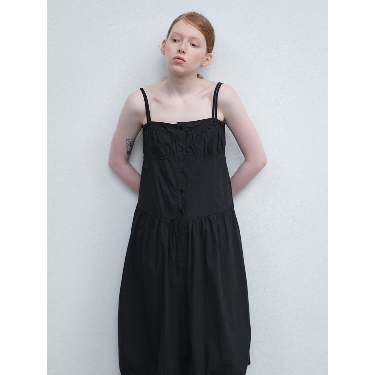 Summer new casual one-word collar pleated design sense solid color lace-up long suspender skirt
