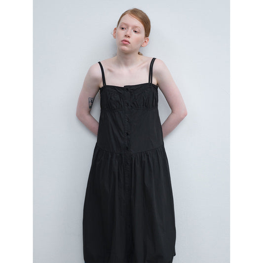 Summer new casual one-word collar pleated design sense solid color lace-up long suspender skirt