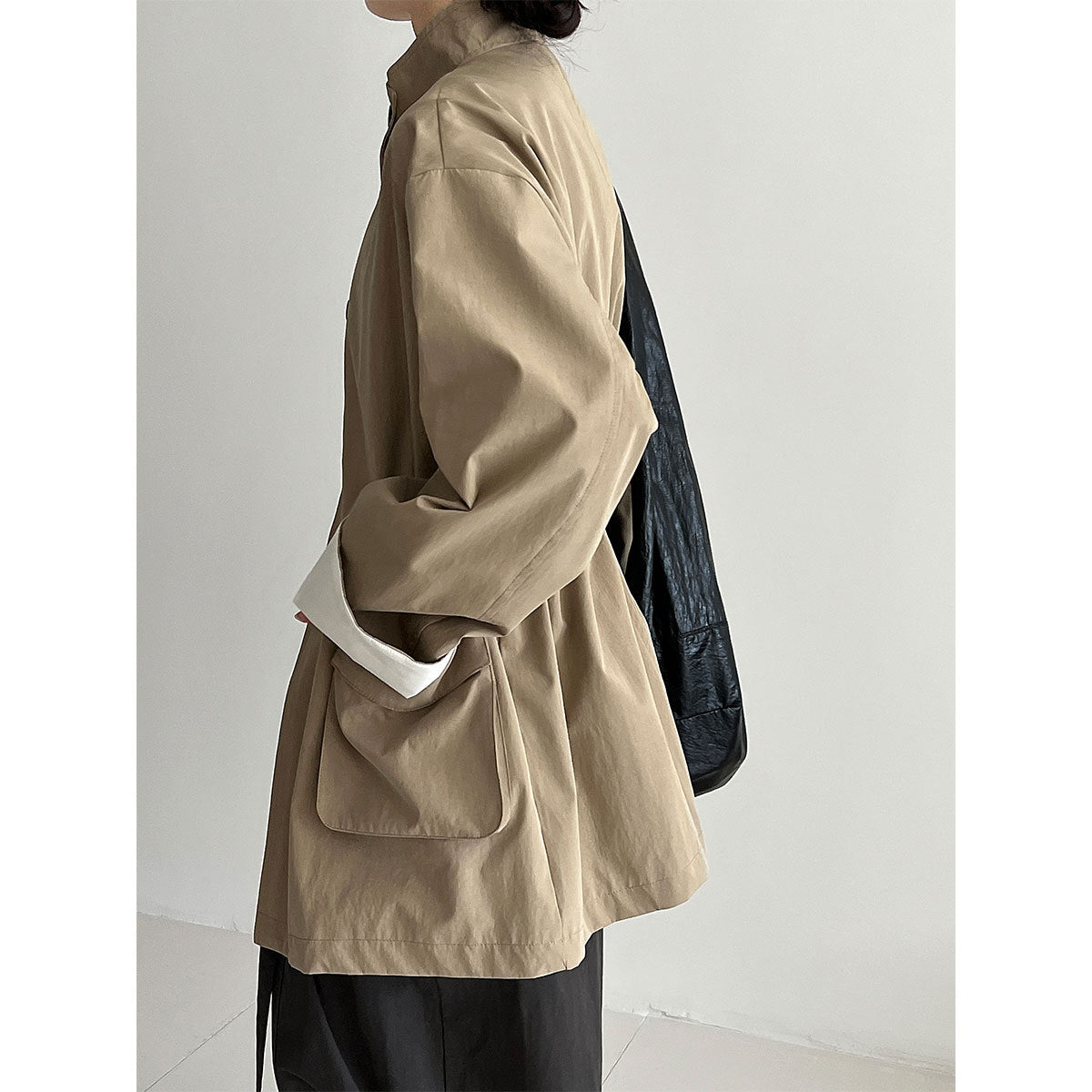Korean medium and long stand-up collar loose drawstring trench coat women's autumn new big pocket design coat