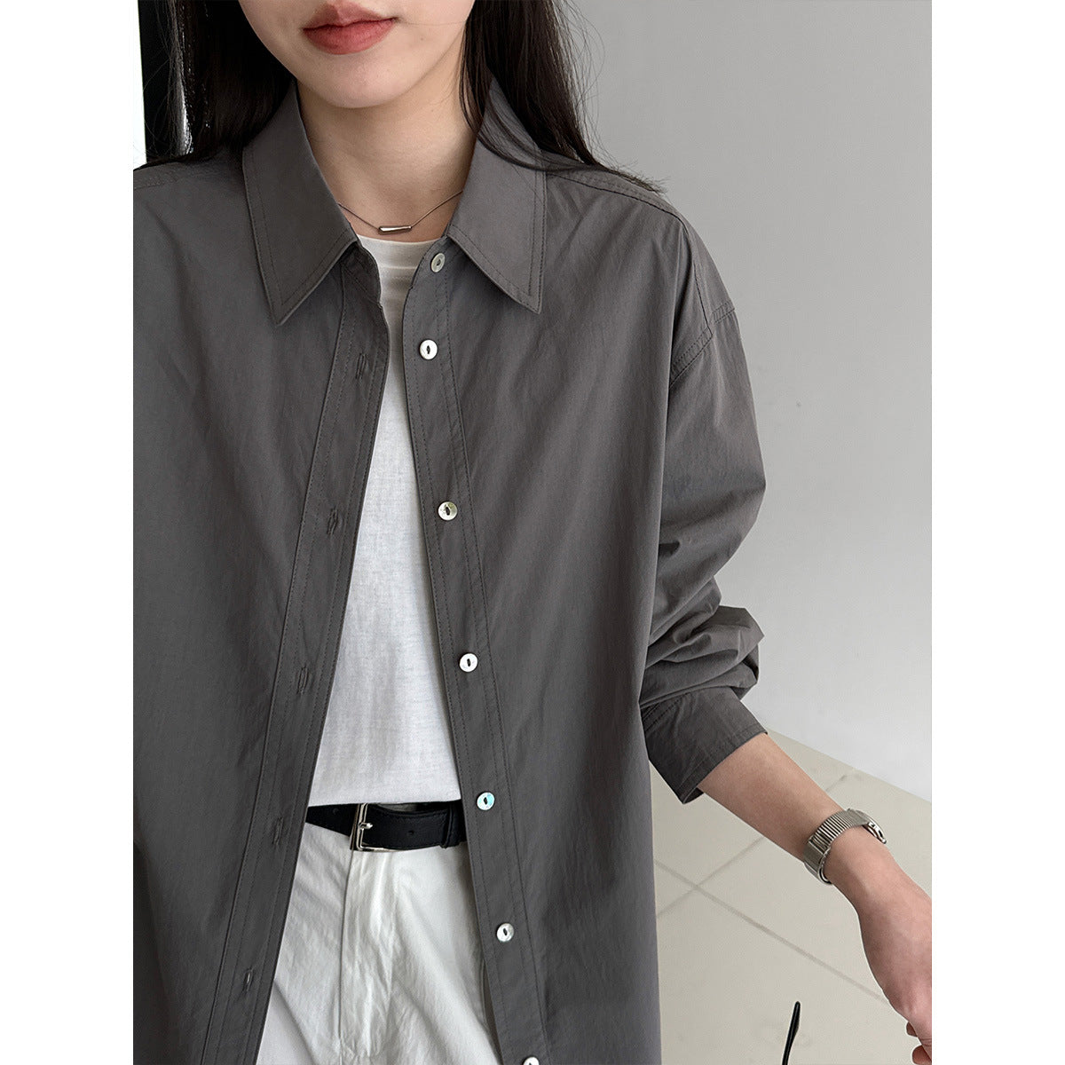 Minimalist high-end design loose long-sleeved shirt women's spring back button waist top